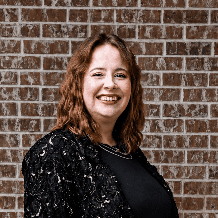 Portrait of Selah, a professional stylist at 209 Salon and Extensions Studio, showcasing their expertise and style.