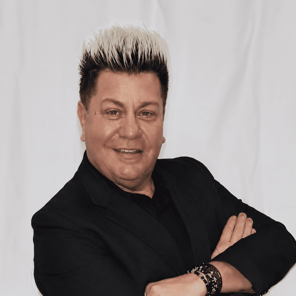 Portrait of Daniel, a professional stylist at 209 Salon and Extensions Studio, showcasing their expertise and style.