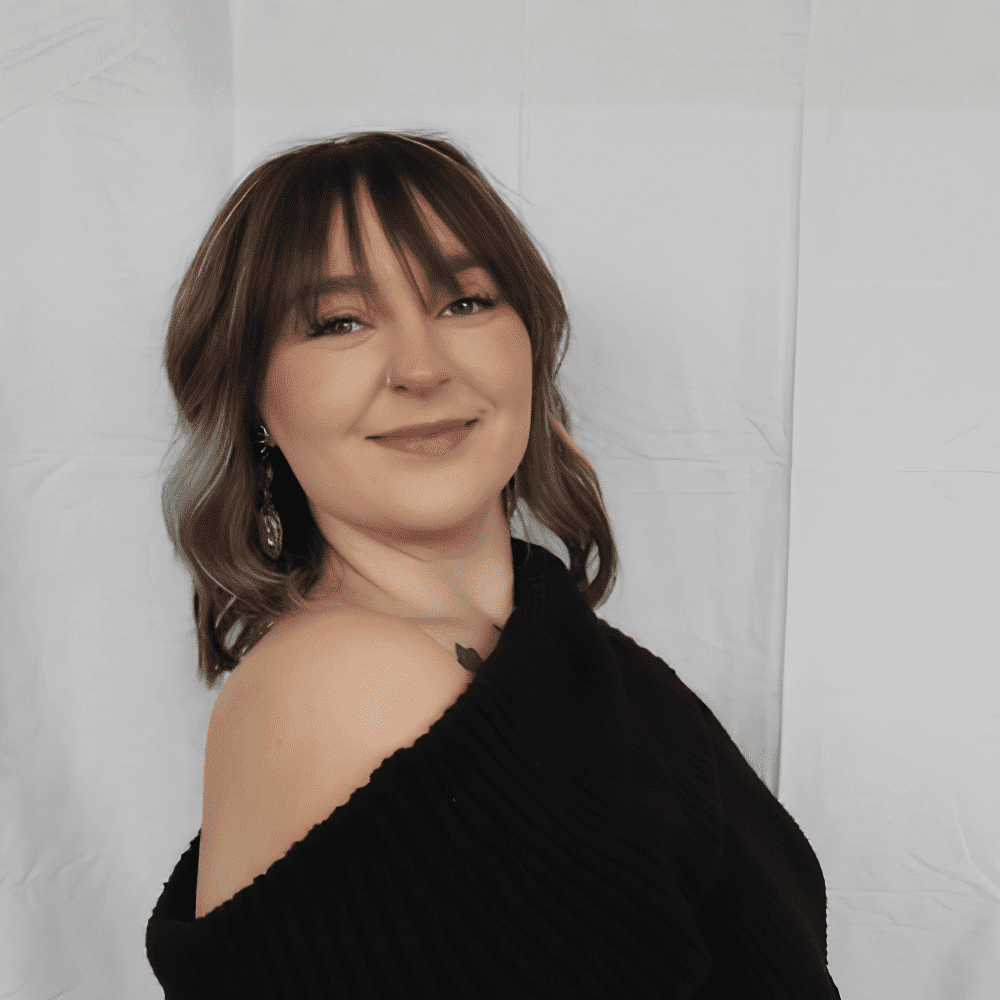 Portrait of Abigayle, a professional stylist at 209 Salon and Extensions Studio, showcasing their expertise and style.