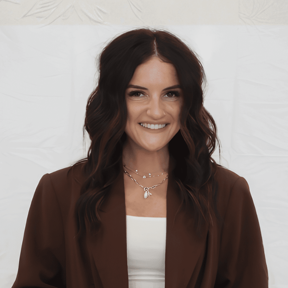 Portrait of Haleigh, a professional stylist at 209 Salon and Extensions Studio, showcasing their expertise and style.
