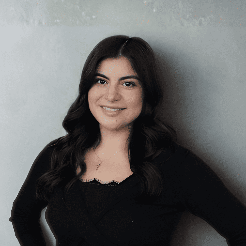 Portrait of Madie, a professional stylist at 209 Salon and Extensions Studio, showcasing their expertise and style.
