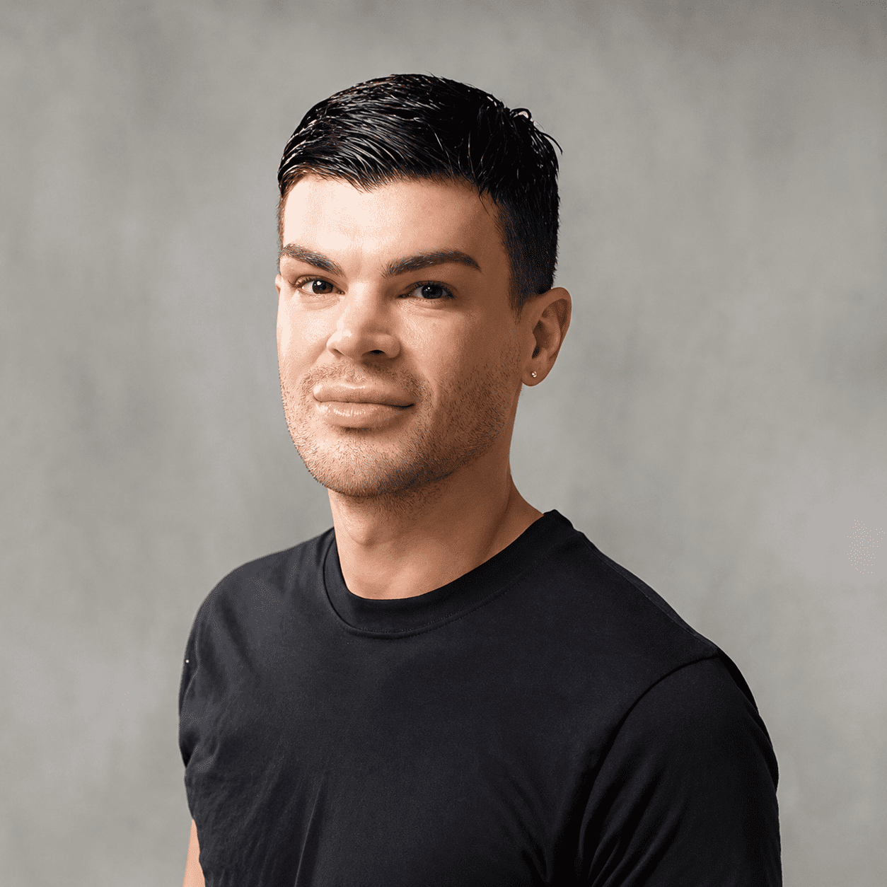 Portrait of Matt, a professional stylist at 209 Salon and Extensions Studio, showcasing their expertise and style.
