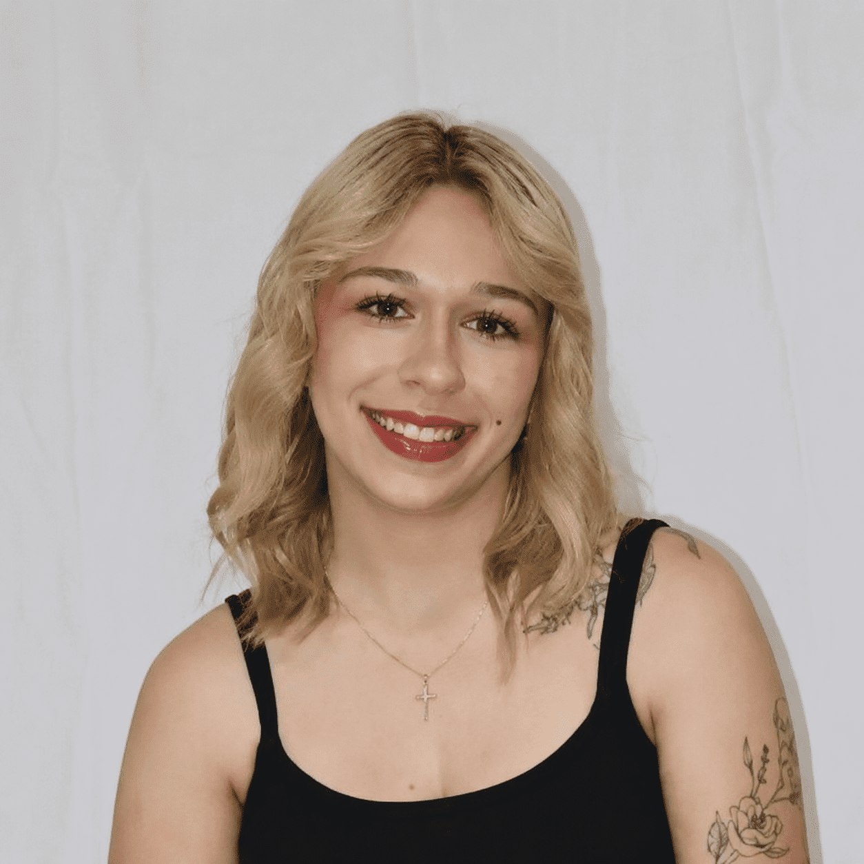 Portrait of Mikayla, a professional stylist at 209 Salon and Extensions Studio, showcasing their expertise and style.