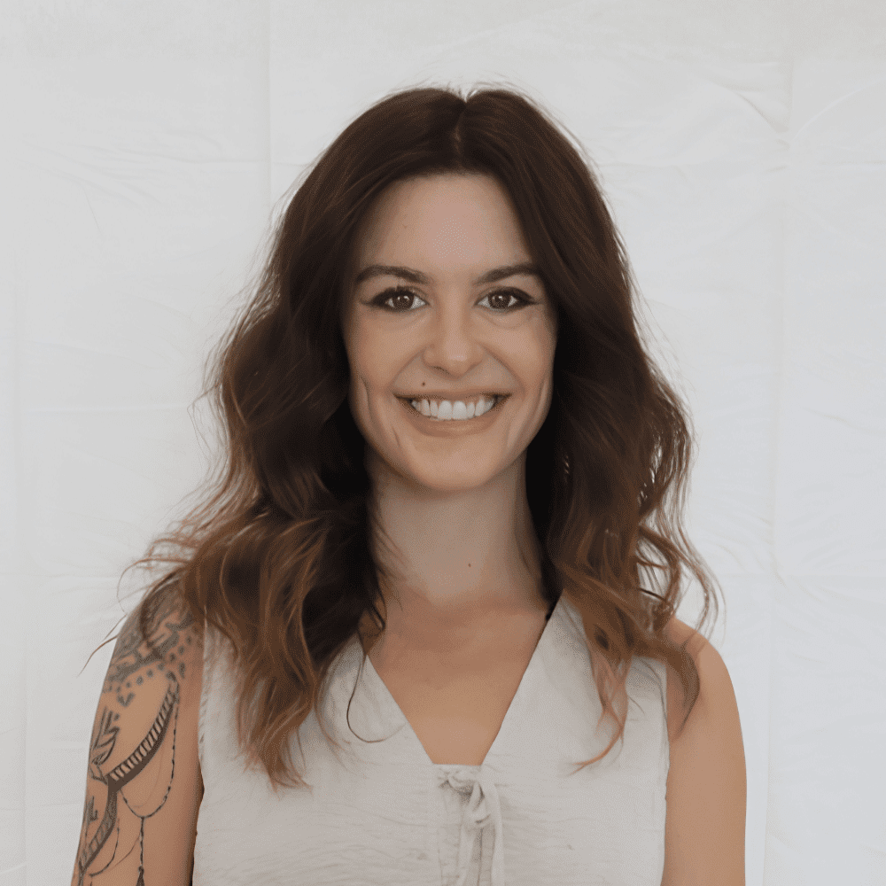 Portrait of Krislynn, a professional stylist at 209 Salon and Extensions Studio, showcasing their expertise and style.
