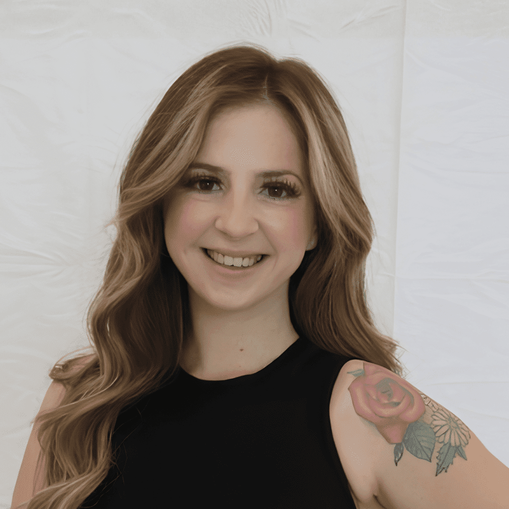 Portrait of Jade, a professional stylist at 209 Salon and Extensions Studio, showcasing their expertise and style.
