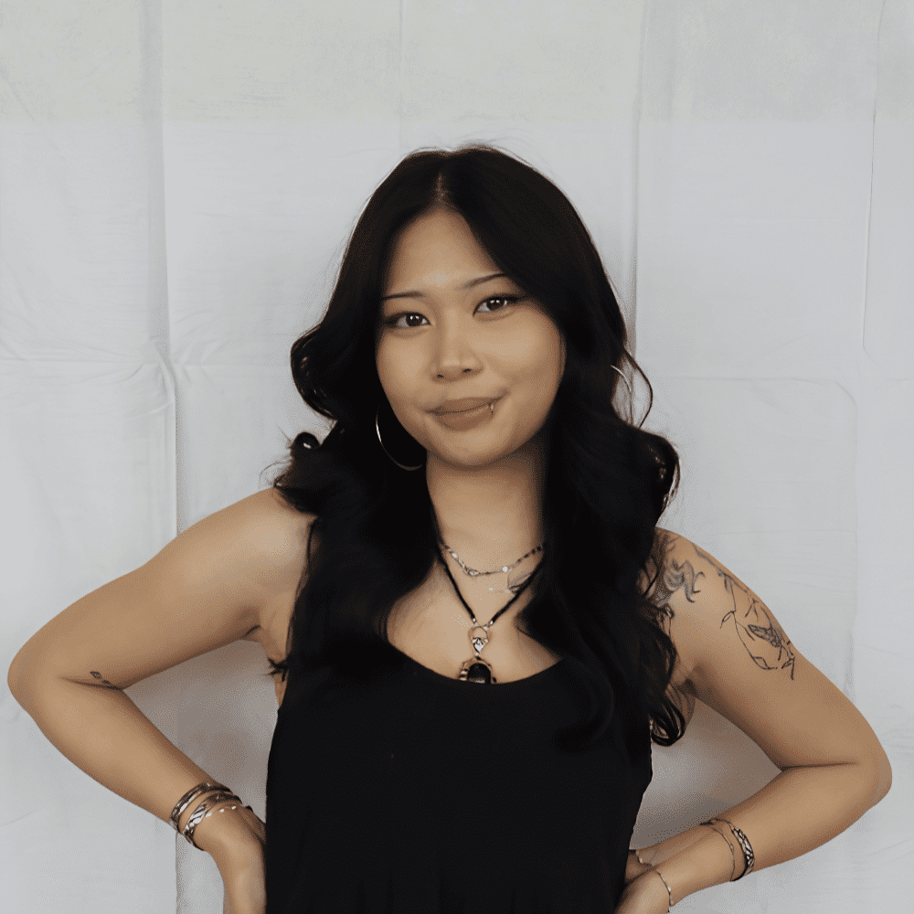 Portrait of Nina, a professional stylist at 209 Salon and Extensions Studio, showcasing their expertise and style.