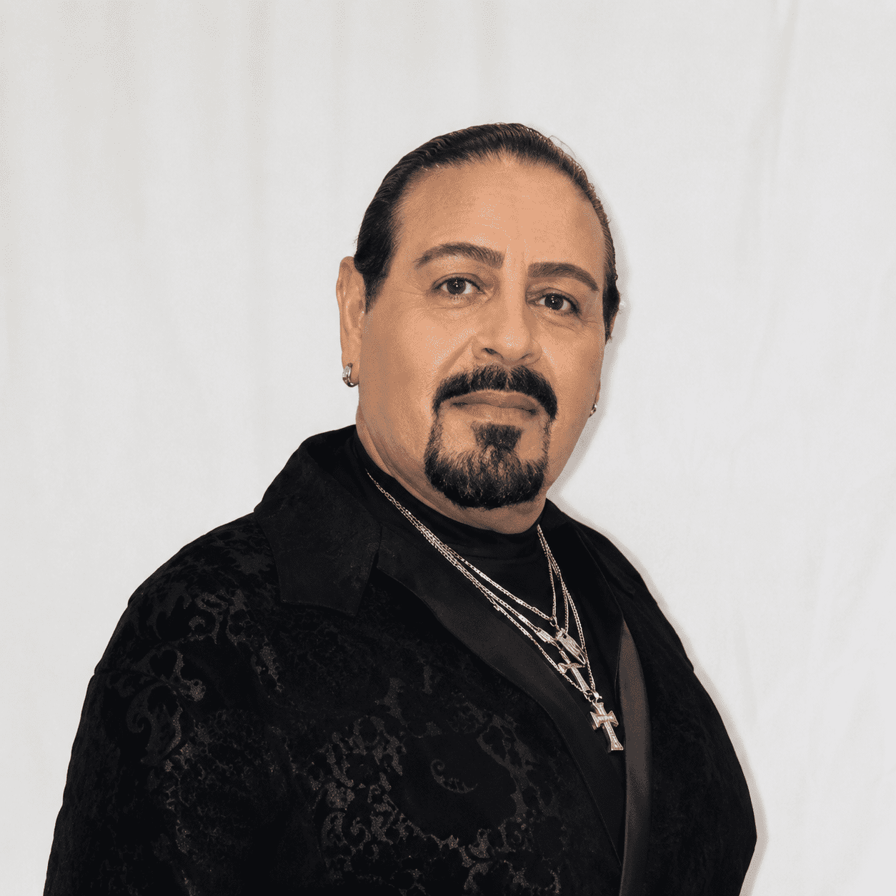 Portrait of Tony, a professional stylist at 209 Salon and Extensions Studio, showcasing their expertise and style.