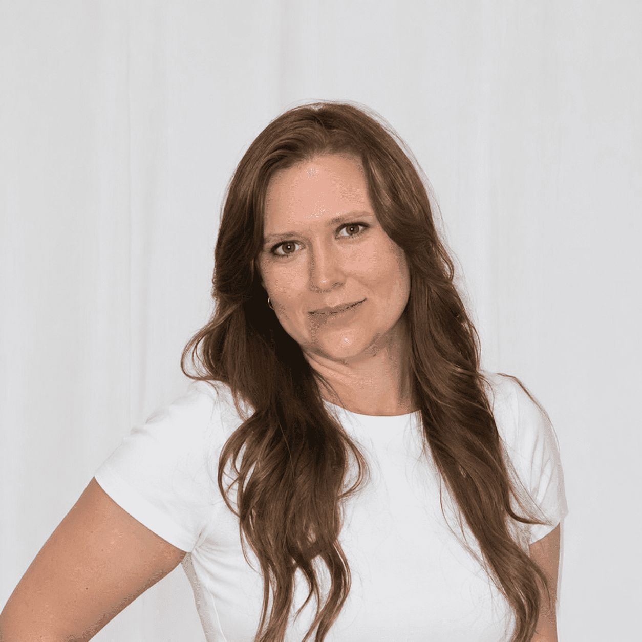 Portrait of Jamie, a professional stylist at 209 Salon and Extensions Studio, showcasing their expertise and style.